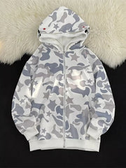 Off-white camo print zip-up hoodie with stars and red accents on the hood.