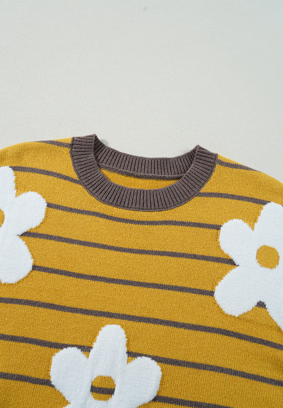 Yellow knit sweater with grey stripes and white intarsia daisies.