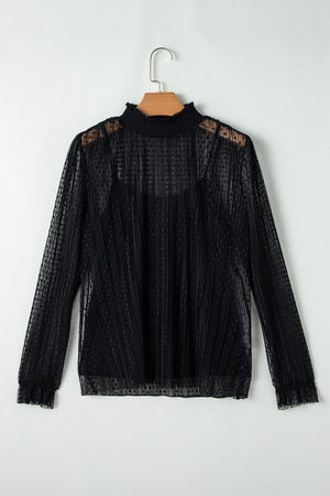Black sheer mock neck blouse with textured dots and vertical pleats.