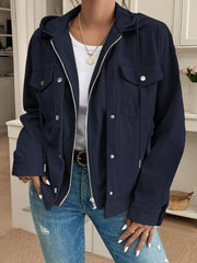 Dark navy waffle knit hooded jacket with buttoned pockets and drawstring hood.