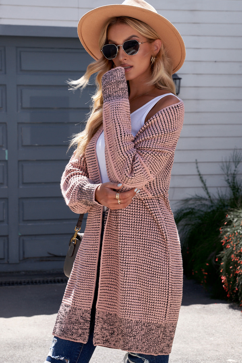 Pink textured puff sleeve open cardigan with contrasting cuffs and hem
