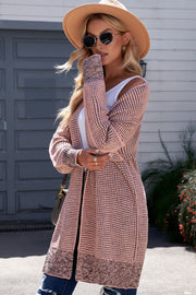 Pink textured puff sleeve open cardigan with contrasting cuffs and hem