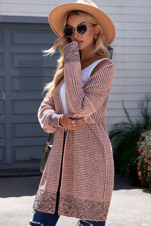 Pink textured puff sleeve open cardigan with contrasting cuffs and hem