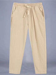 Men's Plus Size Drawstring Loose Fit Pants in White, model styling view
