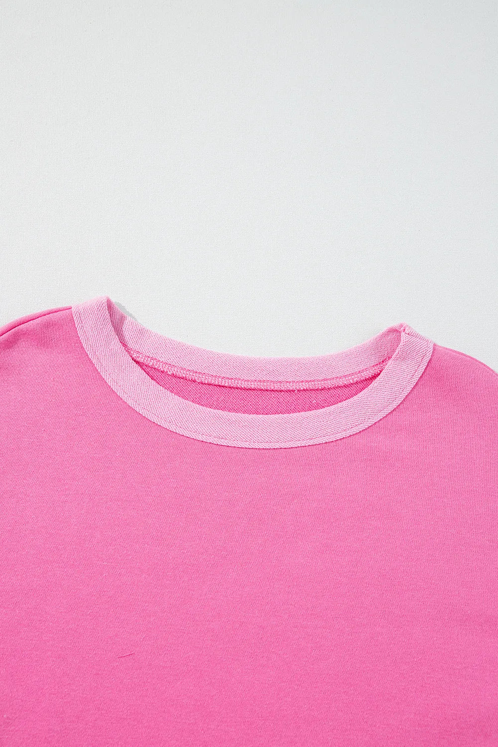 Fuchsia pink cotton loungewear top with contrast trim crew neck.