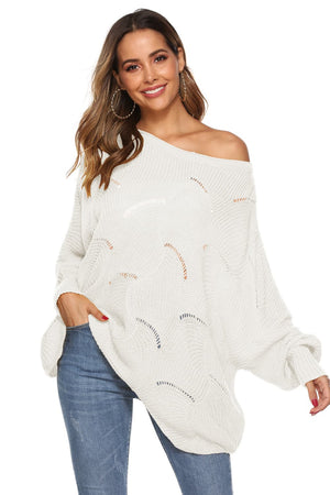 White openwork cocoon sleeve knit sweater with boat neck and relaxed fit.