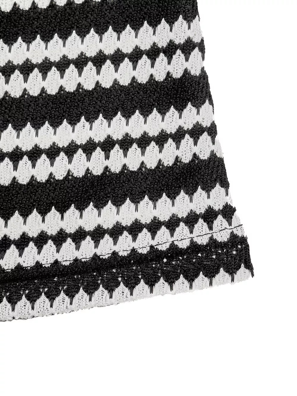 Black and white striped knit maxi dress with a textured pattern.