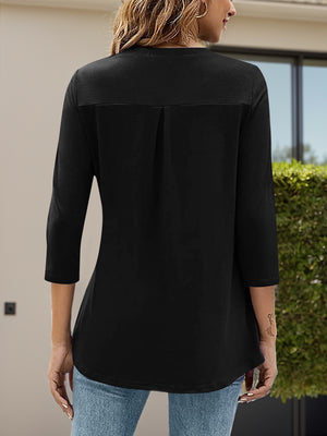 Black three-quarter sleeve top with V-neck and back pleat detail