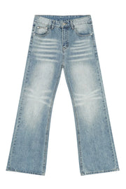 Wide leg washed denim trousers in medium blue with a relaxed fit.