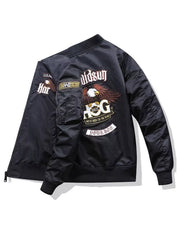 Black bomber jacket with embroidered eagle and text details on back and sleeve.