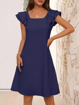 Navy blue a-line dress with ruffled cap sleeves and square neckline.