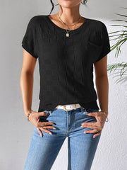 Black textured knit pocket tee with short sleeves and a crew neck.