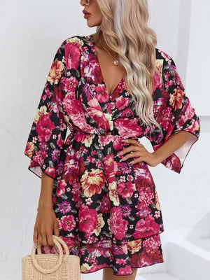 Floral ruffle hem mini dress in Deep Rose with V-neck and flutter sleeves.