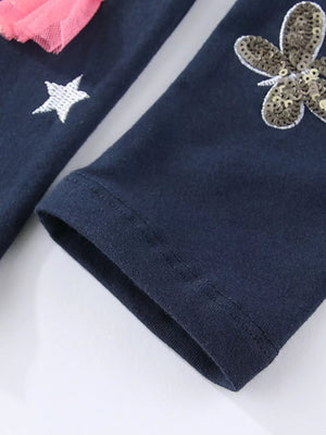 Dark navy cotton leggings with embroidered star and sequin butterfly details.
