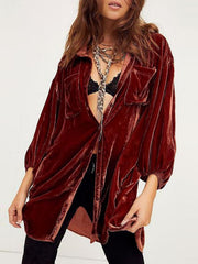 Velvet oversized shirt in brown with button front and chest pockets.