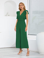 Dark green pleated ruffle wrap jumpsuit with belt and V-neck.