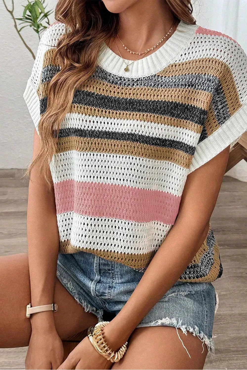 Open knit boxy tee with stripes in white, dusty pink, brown, and black.