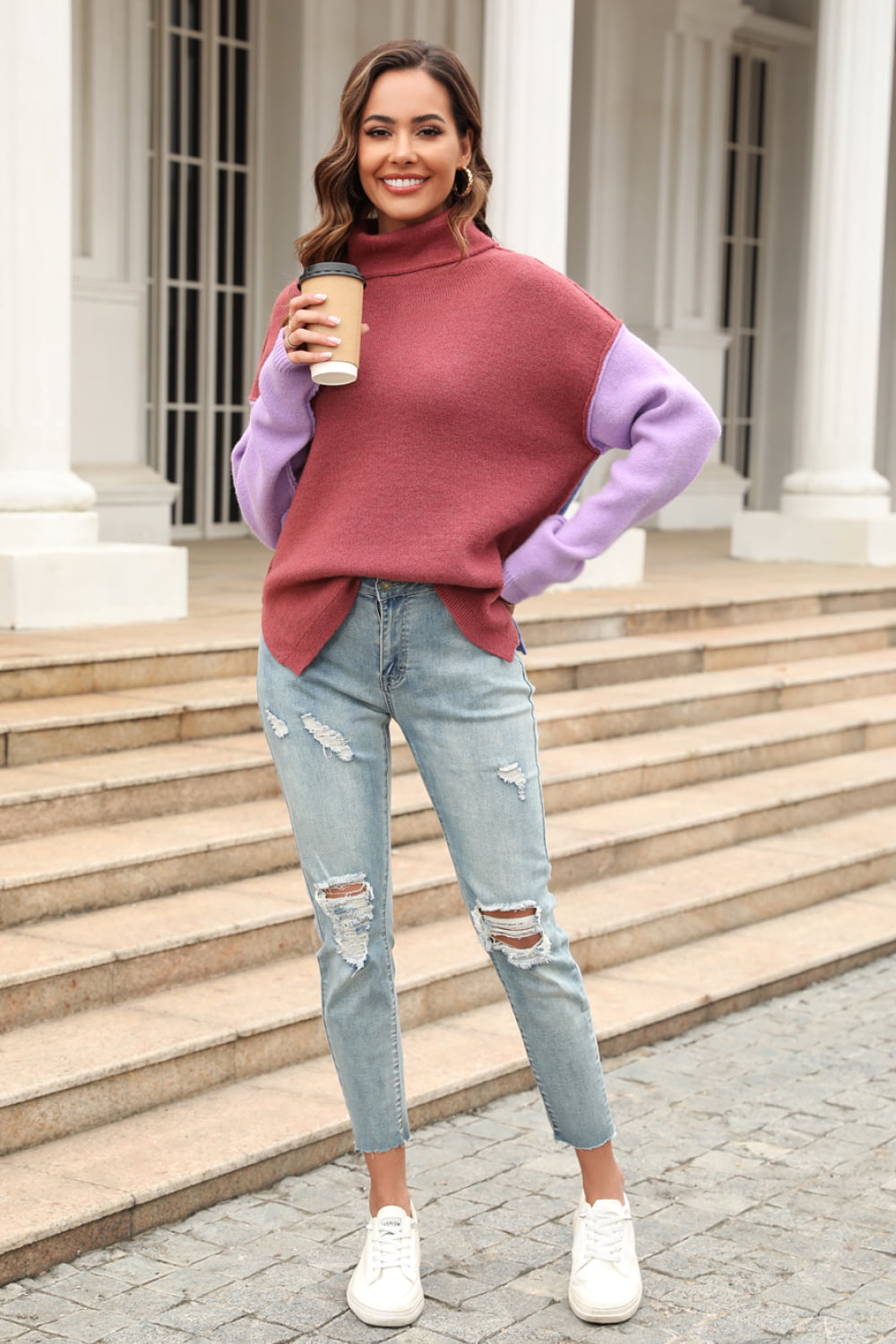 Colorblock turtleneck sweater with asymmetric hem, rust and lilac sleeves, casual style