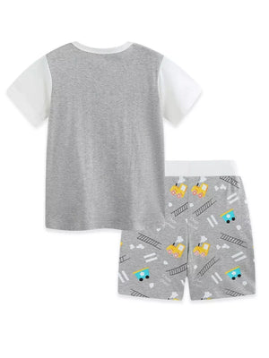 Toddler cotton pajama set with grey t-shirt and grey shorts featuring a whimsical train print.