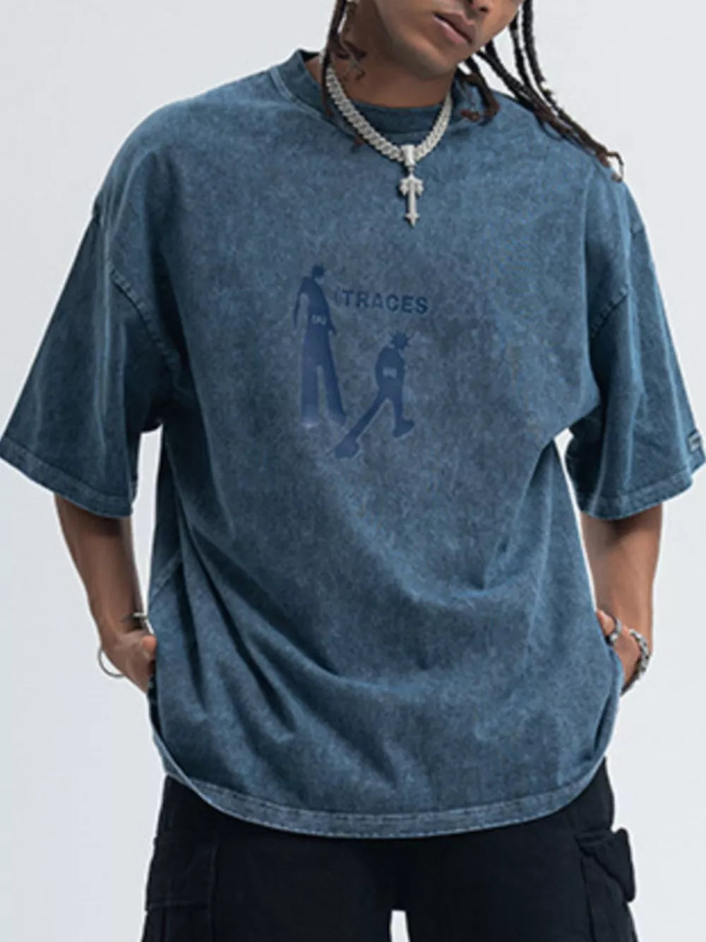 Oversized graphic tee in snowflake blue cotton with relaxed fit and crew neck.