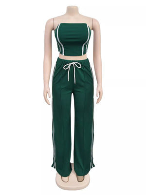 Dark green tube top and wide-leg pant set with white piping and drawstring waist.
