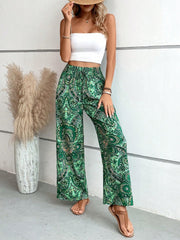 Paisley palazzo trousers in dark green with drawstring waist and wide leg
