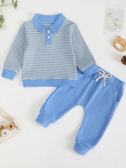 Children's blue and white striped polo shirt and blue waffle knit pants set.