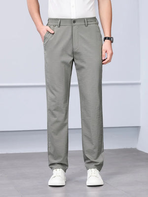 Men's gray classic fit sweatpants with elastic waistband and button closure.
