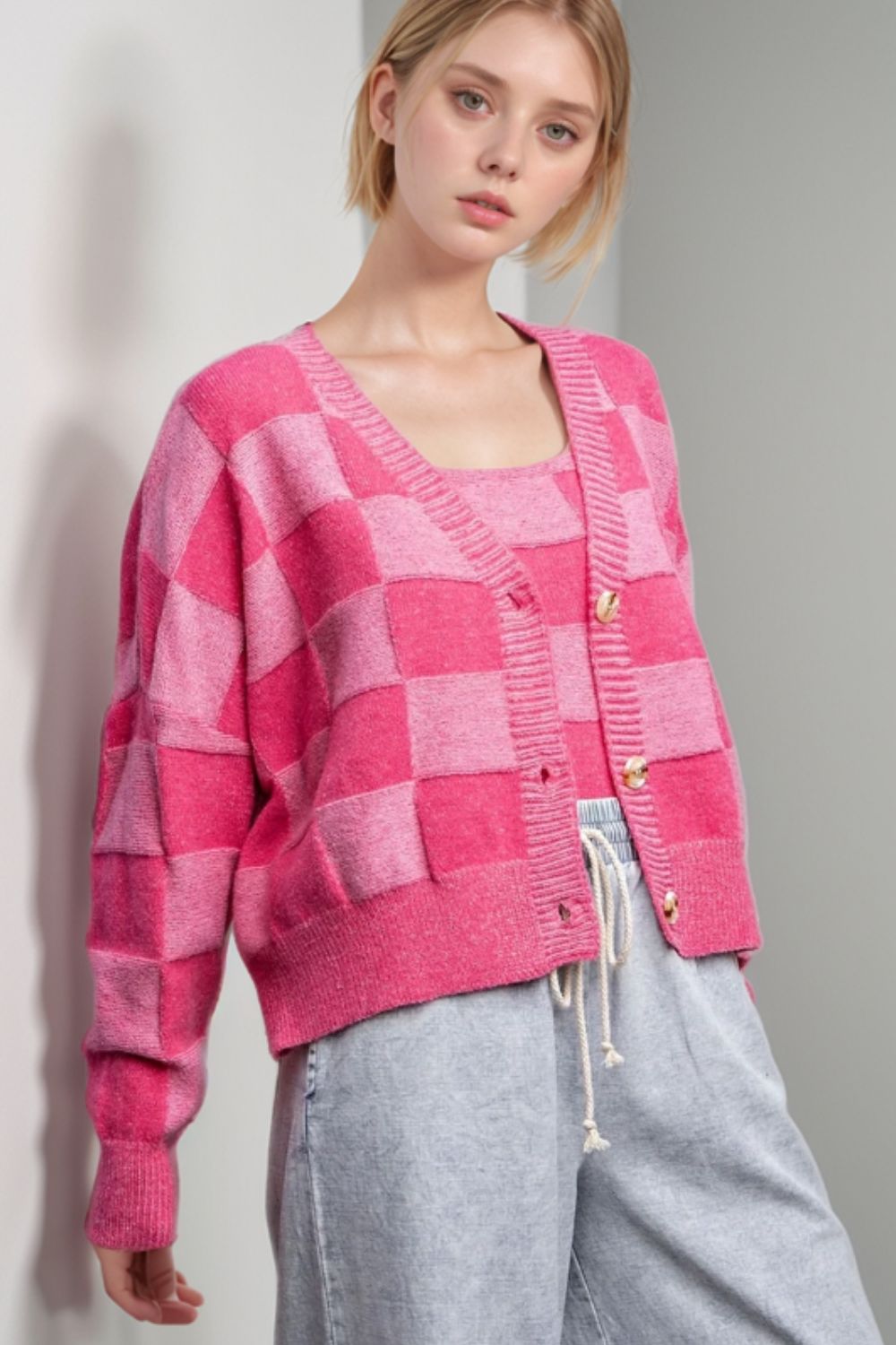 Pink checkerboard knit cardigan and tank set with button front and v-neck.