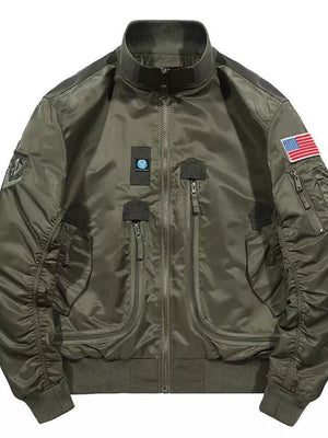 Army green bomber jacket with multiple zippered pockets, patches, and American flag detail.