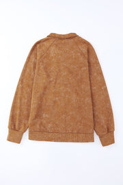 Washed cotton utility jacket in caramel with a collared neckline and ribbed cuffs and hem.