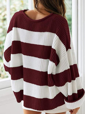 Burgundy and white striped oversized knit sweater with a crew neck and dropped shoulders.