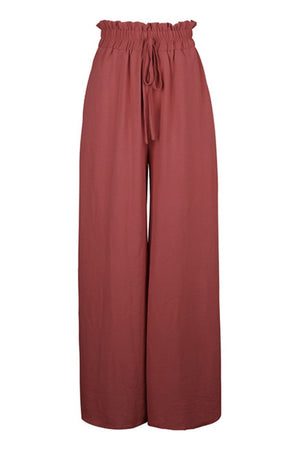 Rust ruffled waist palazzo trousers with drawstring detail