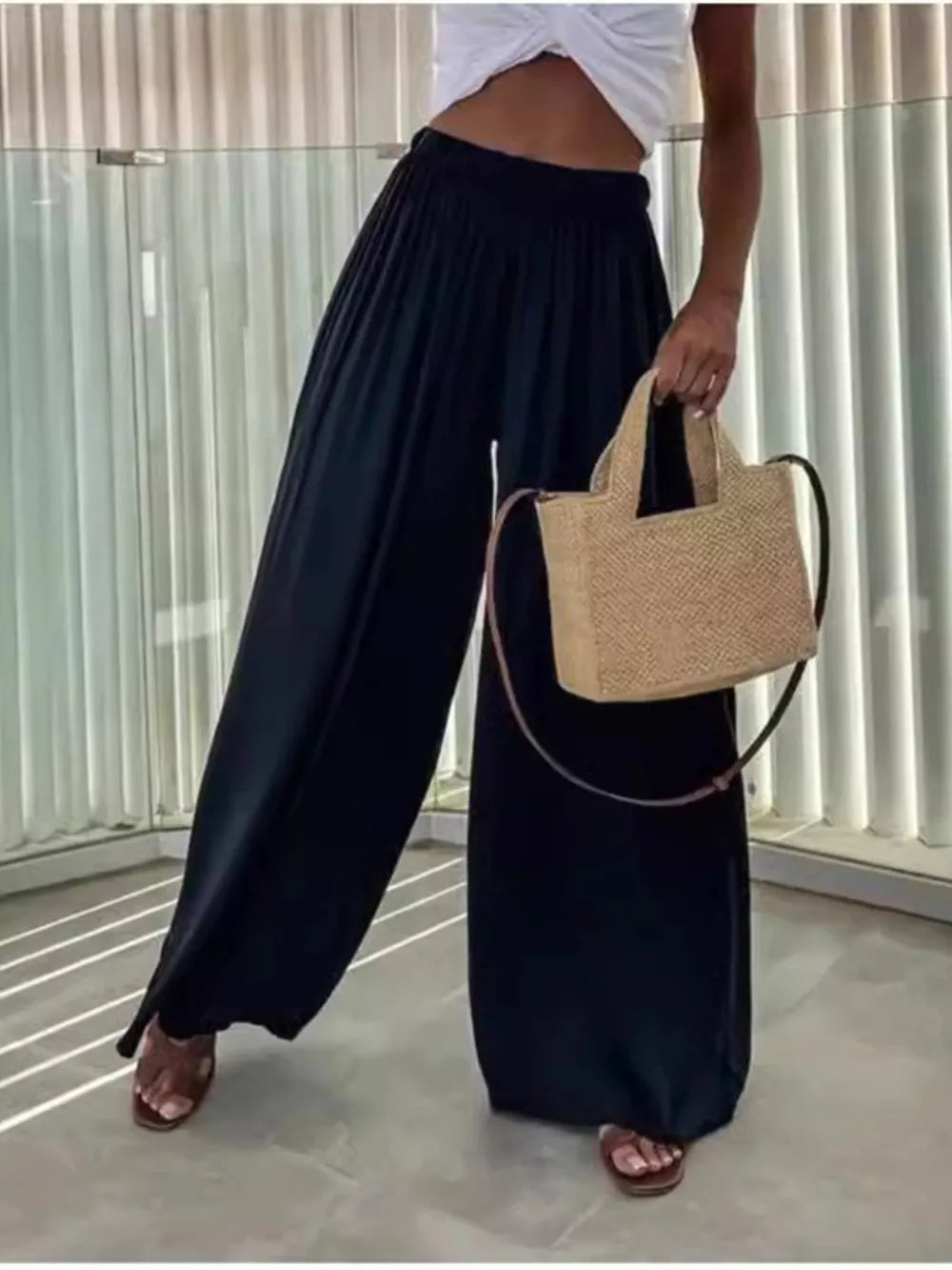 Black maternity pants with paperbag waist and wide legs, cotton fabric