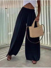 Black maternity pants with paperbag waist and wide legs, cotton fabric