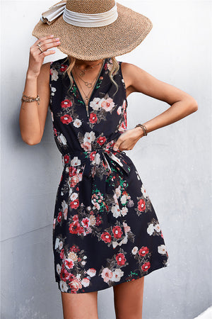 Black floral zip-front mini dress with tie waist and V-neck