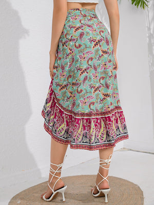 Paisley wrap midi skirt with ruffled hem in multicolor, featuring a bohemian print and flowy silhouette.