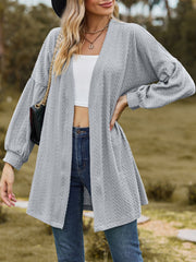 Gray textured open cardigan with balloon sleeves and a relaxed fit.