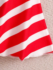 Patriotic toddler two-piece set with red and white stripes, cotton fabric, and zigzag hem detail.