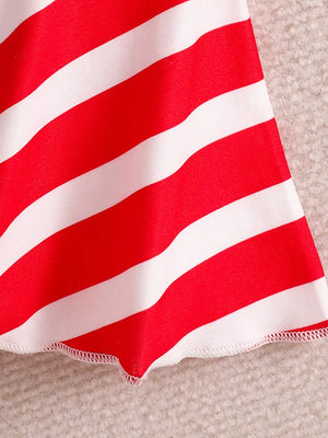 Patriotic toddler two-piece set with red and white stripes, cotton fabric, and zigzag hem detail.