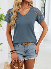 Blue gray waffle knit t-shirt with lace short sleeves and V-neck.