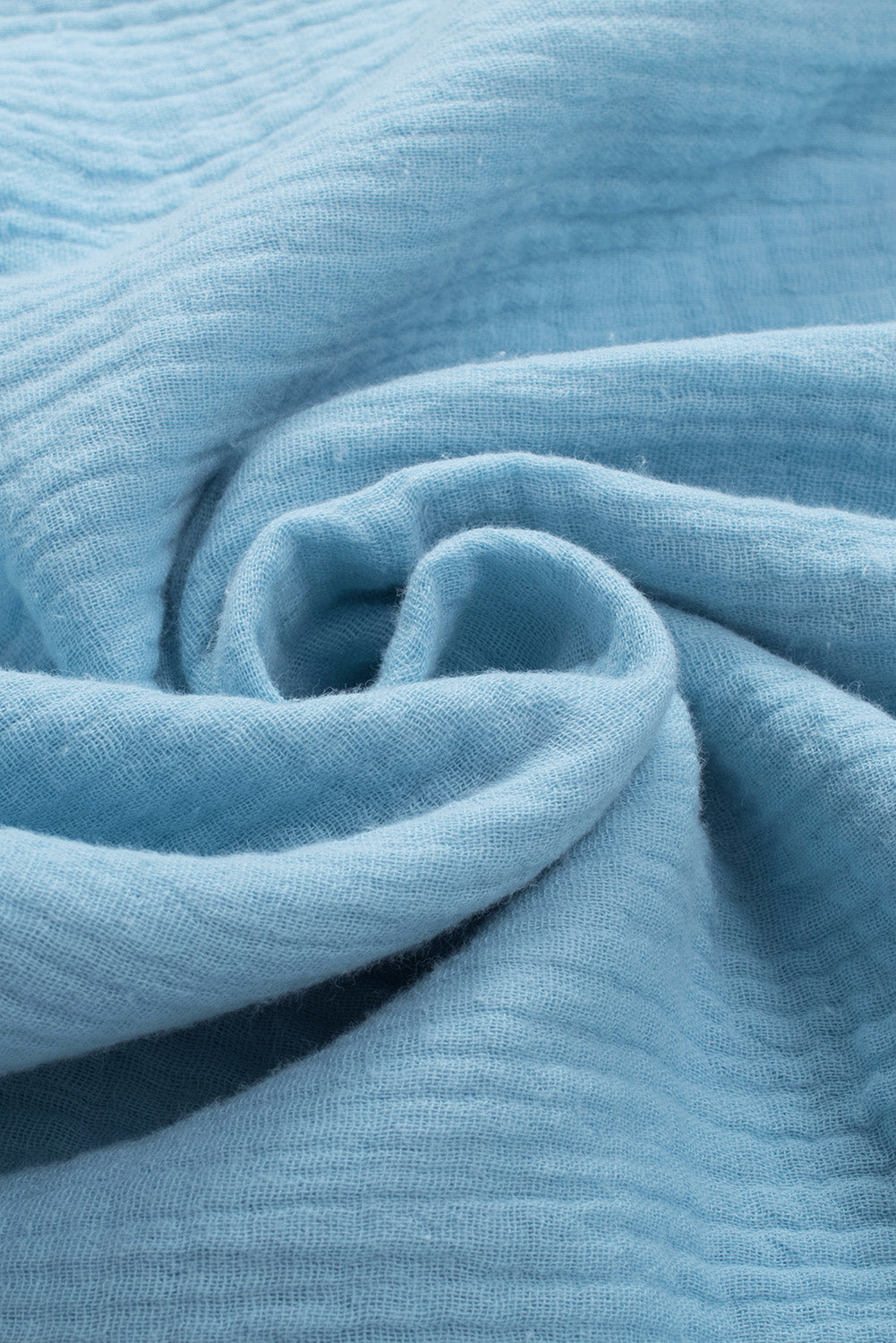 Pastel blue textured gauze blouse with gathered sleeve detail