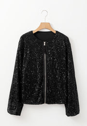 Black sequin bomber jacket with ribbed trim and silver zipper.