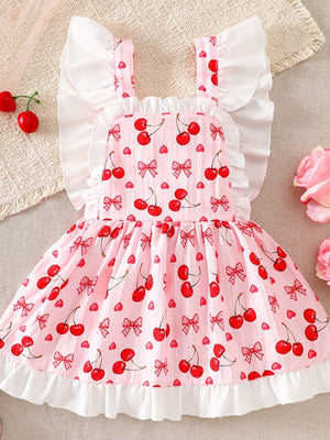 Baby dress with cherry print, bows, and ruffle trim.