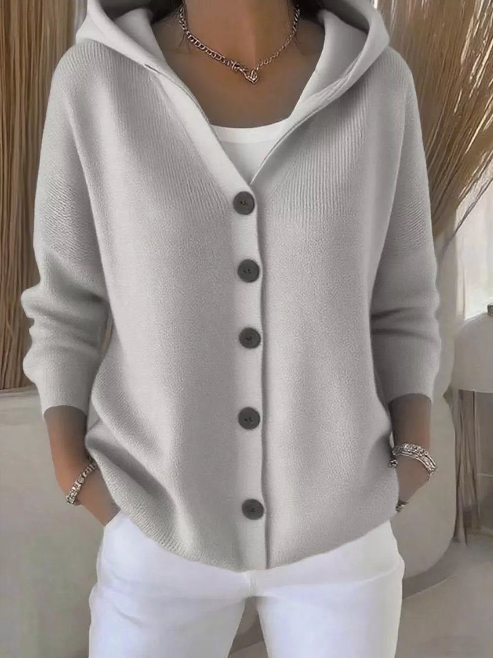Gray hooded knit cardigan with button front, acrylic material, and a casual fit.