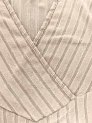 Ribbed wrap top in Caramel with a plunging neckline and pinstripe pattern.