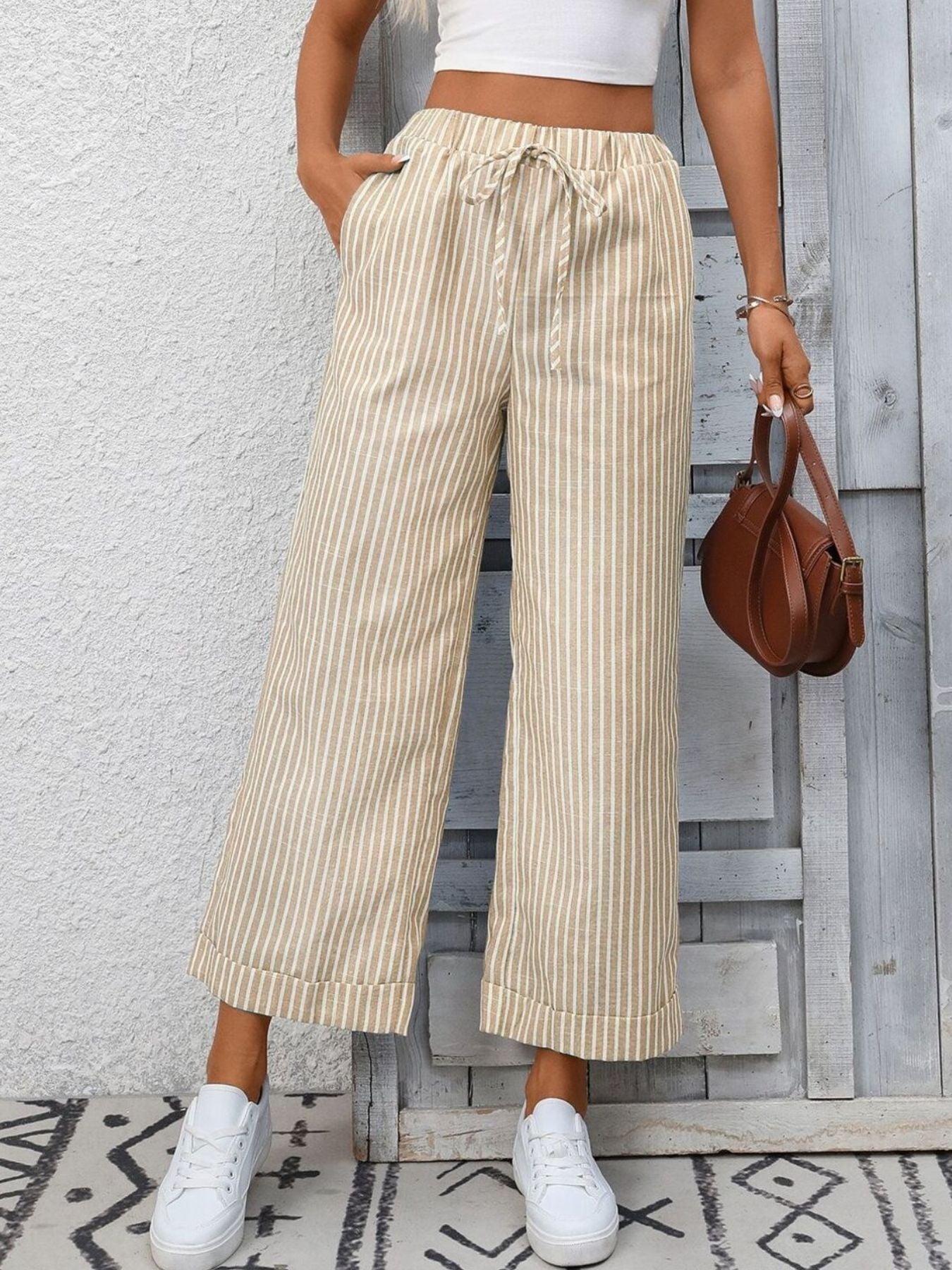 Drawstring wide leg pants in apricot stripe with pockets, cropped length.