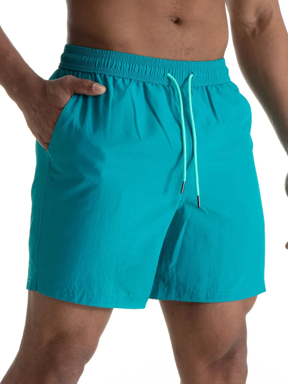 Teal swim shorts with contrast drawcord and side pockets.