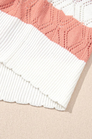 Crochet blouse with stripe pattern in white and coral pink acrylic.