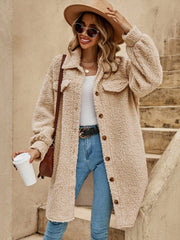Oversized teddy bear shacket in camel with button-down front and chest pockets.